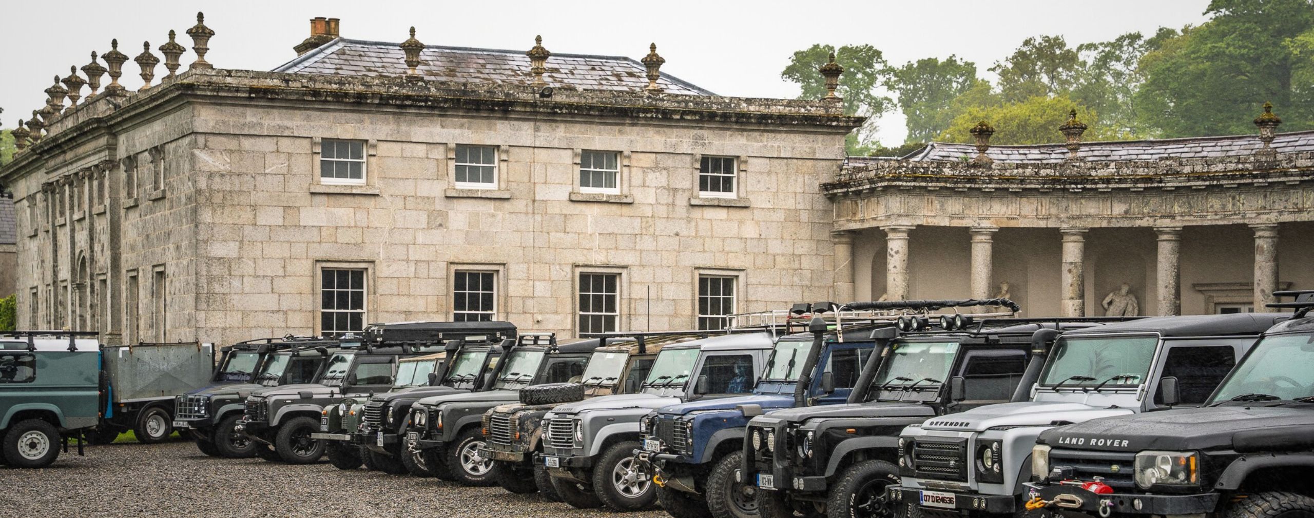 hero landrovers at front of russborough